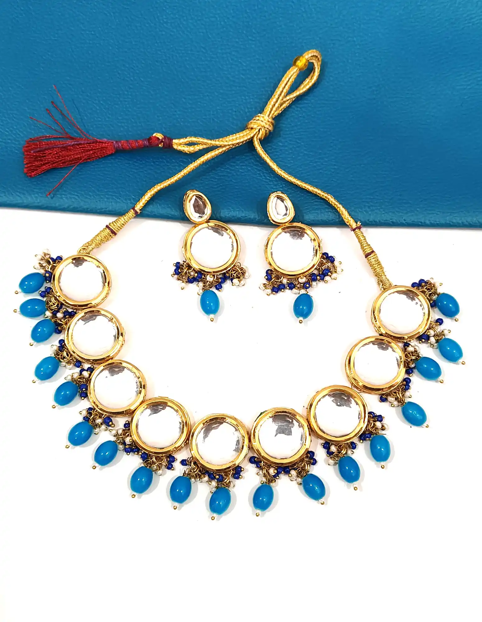 Blug Single Layered Kundan and Earring Set